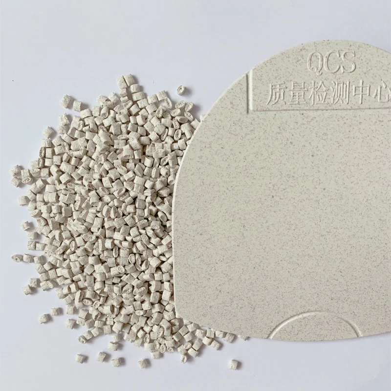Cereal fiber PP pellets beside a molded sample plaque